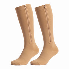 Paire de bas de contention zippés SovaFlex couleur beige, 15-20 mmHg, sur fond blanc