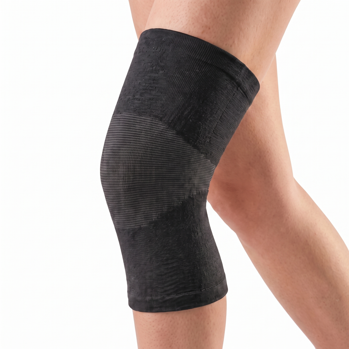 Genouillère de compression SovaFlex noire portée, vue de profil